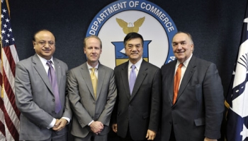 Secretary Locke joined by Sureesh Kumar, Russell Fleming and Gov. John Engler pose after the NMEI press conference