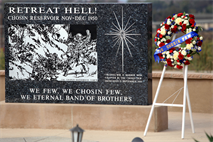 MARINE CORPS BASE CAMP PENDLETON, Calif. -- A wreath stands next to Camp Pendleton’s Korean War Memorial at the 62nd Memorial Anniversary of the Korean War at Camp Pendleton’s Pacific Views Event Center, Sept. 22. The event was held to honor the veterans who fought during the Landing on Inchon, in the street of Seoul and in the northern mountains near the Chosen Reservoir.