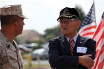 MARINE CORPS BASE CAMP PENDLETON, Calif. -- Master Sgt. Ruben Urquidez, the operations and training chief for Marine Corps Base Operations, speaks with Yong Lim Lee, a Republic of Korea’s veteran, at the 62nd Memorial Anniversary of the Korean War at Camp Pendleton’s Pacific Views Event Center, Sept. 22. The event was held to honor the veterans who fought during the Landing on Inchon, in the street of Seoul and in the northern mountains near the Chosen Reservoir.
