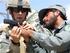 A U.S. soldier trains an Afghan police officer (Credit: DoD Photo/U.S. Army/Cpl. Thomas Childs)