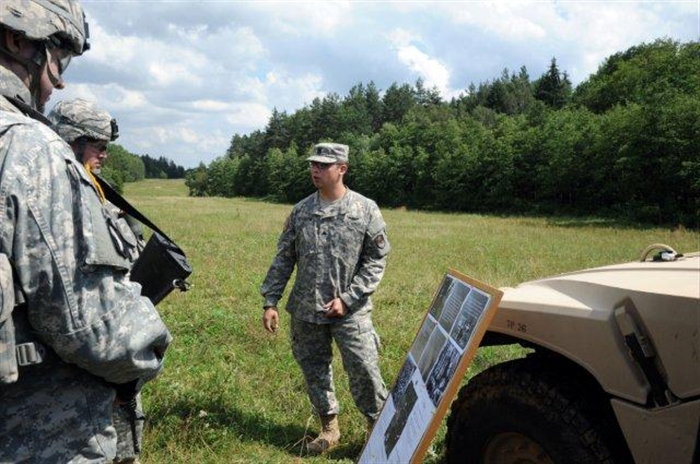 SGT Joseph Chacon, assigned to the Joint Tactical Ground Station (JTAGS) conducts a First Aid brief before the actual exercise at the Panzer Range Complex. First Aid is one of the requirements for the annual Warrior Training Exercise.