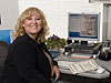 At her desk in building 4839, Lisa Mattox has a smile and a welcoming word for all new employees at Dryden.