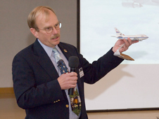 Bob Meyer, program manager of NASAs SOFIA program, explains highlights of the program to middle school students attending the Math and Science Odyssey.