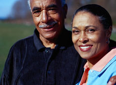 A photograph of a man and a woman smiling