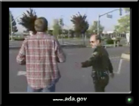 photo of a man being stopped by a policeman