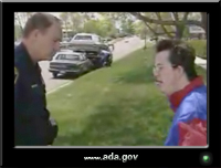 photo of a young man talking to a policeman