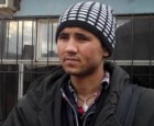 Afghani migrant at the Serbia-Macedonia border