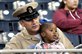 Navy Master Chief Fluvio Tamborini watches batting practice with his son before one of the last major league baseball games of the season between the San Diego Padres and the Los Angeles Dodgers at Petco Park in San Diego, Sept  25, 2012. Tamborini is assigned to Helicopter Sea Combat Squadron 85. U.S. Navy photo by Petty Officer 2nd Class Jonathan P. Idle