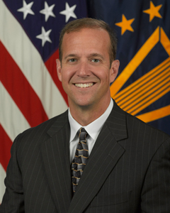 Michael E. Reheuser, Director, DPCLO