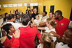 Secretary of Education Arne Duncan served with City Year AmeriCorps members and volunteers to help beautify Green Elementary School in Washington, DC.