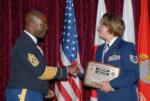 Photo 2: TSgt Tracy Zeece is recognized as an NCO Academy Distinguished Graduate.  TSgt Zeece, the Misawa Air Base Legal Office NCOIC of Military Justice, represented the 35th Fighter Wing well as she excelled among her peers at the most recent NCOA in Okinawa, Japan