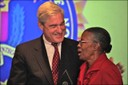 FBI Director Robert S. Mueller recognized community leaders from around the country at FBI Headquarters in Washington during the 4th annual Director’s Community Leadership Awards on March 16, 2012. Recipients were selected by their area FBI field offices and honored for outstanding contributions to their communities. “You are all determined to create a safer world for our children,” said Director Mueller. “Just as important, you are all devoted to upholding the rule of law and defending the freedoms we cherish.” Here, the Director leads a birthday salute to Herreast Harrison, honored by the New Orleans FBI for her efforts to promote literacy and cultural diversity. For more information, see http://www.fbi.gov/news/stories/2012/march/dcla_031612.