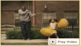 Father practices cheer with his daughter