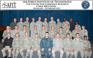 Lt. Cmdr. Matthew R. Fomby, U.S. Navy, is seated first row center, as Cyber 300 class leader. He is the first individual to graduate from both the Cyber 200 and the Cyber 300 professional Continuing Education courses conducted at the Air Force Institute of Technology. 