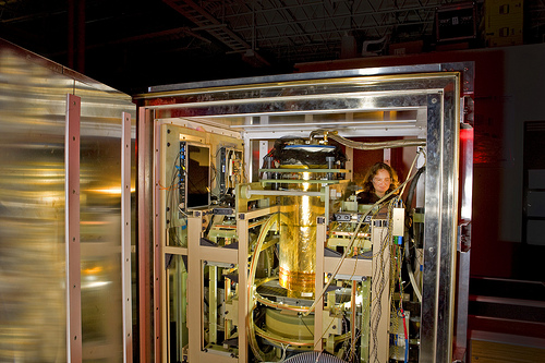 Member of the SQUID team, with the apparatus used to study magnetic resonance imaging