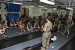 Corporal Elaine C. Romain, assessment consequence management team member, Chemical, Biological, Radiological and Nuclear Defense Platoon, 15th Marine Expeditionary Unit, gives a class to Weapons Company, Battalion Landing Team 3/5, 15th MEU, on some of the different tools CBRN Marines use to operate in contaminated environments, aboard the USS Peleliu, Oct. 4. The 15th MEU's CBRN Defense Platoon is spending an entire month preparing the 2,400 servicemembers that make up the MEU on how to properly operate in contaminated environments. The 15th MEU is currently embarked as part of the Peleliu Amphibious Ready Group, while they serve as the nation's rapid-response sea-based Marine Air Ground Task Force for Western Pacific Deployment 12-02. Romain, 21, is from New Orleans.