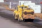 Water is sprayed on ash-covered taxiways and runways, Anchorage International Airport