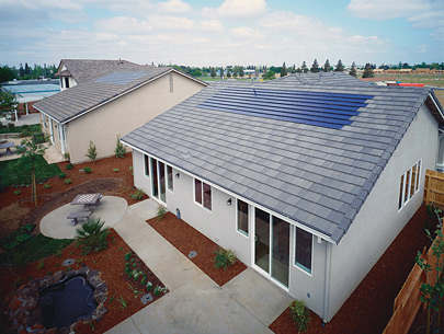 Photo is of a row of solar panels.