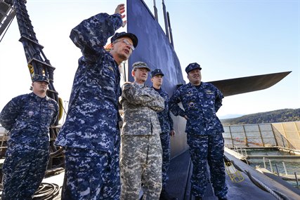 Navy Rear Adm. Robert M. Hennegan briefs Army Gen. Martin E. Dempsey, chairman of the Joint Chiefs of Staff, aboard the USS Maine submarine at Naval Base Kitsap-Bangor in Silverdale, Wash., Oct. 3, 2012.