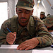 Afghan National Army Basic Warrior Trainee sits through a Literacy class (14 Oct 10)