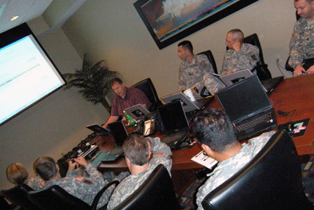 Army personnel meeting for training