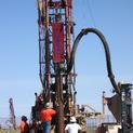 Crew Drilling a Well