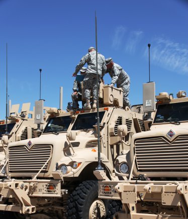 In the months leading up to each Network Integration Evaluation, Soldiers, engineers, combat developers and test officials integrate hundreds of vehicles and systems at the Integration Motor Pool at Fort Bliss, Texas, while Soldiers from the 2nd Brigade Combat Team, 1st Armored Division (shown here) run various tests on the systems under evaluation and systems under test prior to taking the systems out to the field during the NIE.