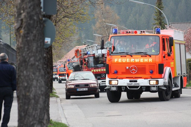The exercise begins a little after 6 p.m. April 22 as the Garmisch Fire Department responds to the call; a convoy of fire trucks is about to turn into Sheridan Kaserne. (photo by Angela Shannon, Marshall Center)