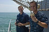 Seaman Nicholas Fisher, left, and Seaman Abel Cardona stand fantail watch. 