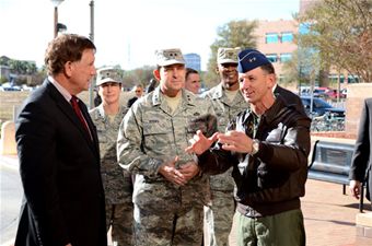 Maj. Gen. (Dr.) Byron C. Hepburn briefs Assistant Secretary of the Air Force Installations, Environment and Logistics Terry Yonkers 