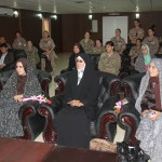 Afghan Women attending the meeting and the female ISAF soldiers that participated in the meeting and delivery of humanitarian aid.