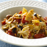 Photograph of Whole Wheat Bow-Tie Pasta With Puttanesca Sauce.