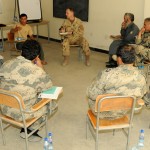 Afghan Border Patrol Officers listen during one of three classes taught during the Blue Border Professionalization Conference at the Afghan National Police Training General Command, July 2.