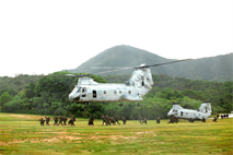 Marines with Company G., Battalion Landing Team 2nd Battalion, 1st Marine Regiment, 31st Marine Expeditionary Unit, depart from CH-46E Sea Knight helicopters here, Aug. 9. Inserting via helicopters with Marine Medium Helicopter Squadron 262 (Reinforced), the Marines raided a notional town, neutralizing all enemy personnel and capturing a high-value individual. The 31st MEU is the only continuously forward-deployed MEU and is the Marine Corps' Force in readiness in the Asia-Pacific region.