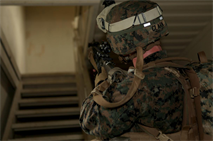 A Marine with Company G., Battalion Landing Team 2nd Battalion, 1st Marine Regiment, 31st Marine Expeditionary Unit, maintains security on a stairwell inside an enemy structure here, Aug. 9. Inserting via CH-46E Sea Knight helicopters with Marine Medium Helicopter Squadron 262 (Reinforced), the Marines raided a notional town, neutralizing all enemy personnel and capturing a high-value individual. The 31st MEU is the only continuously forward-deployed MEU and is the Marine Corps' Force in readiness in the Asia-Pacific region.