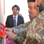 Afghan National Army 205th Corps deputy commander, Brig. Gen. Amir Baqaayi, along with Regional Support Command (South) deputy commander, U.S. Army Lt. Col. John Hanson, and 205th Corps Sgt. Maj. Kefayatulla Safi, cut the ribbon during a ribbon cutting ceremony of the new bakery in Camp Hero, Afghanistan, Mar. 10, 2012. Afghan and coalition members participated in the ribbon cutting ceremony to signify the opening and transfer of the facility to the 205th Corps. When fully equipped, the bakery will be capable of producing 8,000 pieces of flat bread a day. (U.S. Air Force photo by Tech. Sgt. Renee Crisostomo/Released)