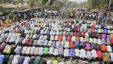 Muslims pray while Christians form a protective human chain around them during a protest on common problems faced in Nigeria, January 1, 2012.