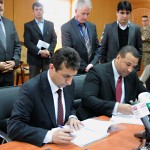 APPF Deputy Minister Jemal Abdul Naser Sidiqi and Ian Spence from international Relief and Development (IRD) sign contracts at a ceremony March 7, 2012 at the Ministry of Interior. The APPF and IRD signed three contracts for the APPF to provide security service to development projects around Afghanistan that IRD is performing for the U.S. Agency for International Development. (Photo by Lt. Col. John Hutcheson)