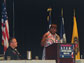 Photo of Kara Hayes, Wounded Warrior, presenting a Transition Success Story.