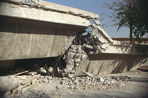 Photo of bridge devastated by earthquake.