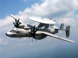 An E-2C Hawkeye assigned to the Greyhawks of Carrier Airborne Early Warning Squadron (VAW) 120 flies over Jacksonville, Fla. U.S. Navy photo.