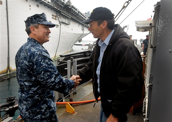 AUGUSTA BAY, Sicily (April 14, 2011) Vice Adm. Harry B. Harris Jr., Commander, U.S. Sixth Fleet, greets Mr. Jack Begley of the merchant marine force, during a visit to Rescue and Salvage Ship USNS Grasp (T-ARS 51) during its port visit in Augusta Bay, Sicily. Kearsarge is supporting maritime security operations and theater security cooperation efforts in the U.S. 6th Fleet area of responsibility. (U.S. Navy photo by Mass Communication Specialist 2nd Joshua Mann/Released)