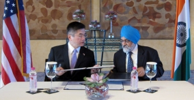 Secretary Locke is signing the Energy Cooperation Program MOU with Indian Planning Commission Deputy Chairman Montek Singh Ahluwalia. The ECP is a partnership that brings together U.S. and Indian companies and both two governments to focus on specific projects and initiatives that will develop the clean energy marketplace and help realize its potential within India.