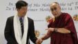 Tibet's exiled spiritual leader the Dalai Lama (R) and Lobsang Sangay, Prime Minister of the Tibetan government-in-exile, arrive for a news conference in Vienna, May 25, 2012.