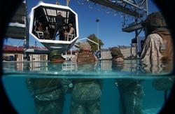 Marines wait their turn in the dunker.