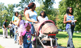 Women and children participating in the Baby Buggy Parade