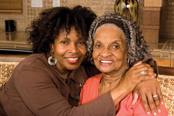 A daughter hugging her mother