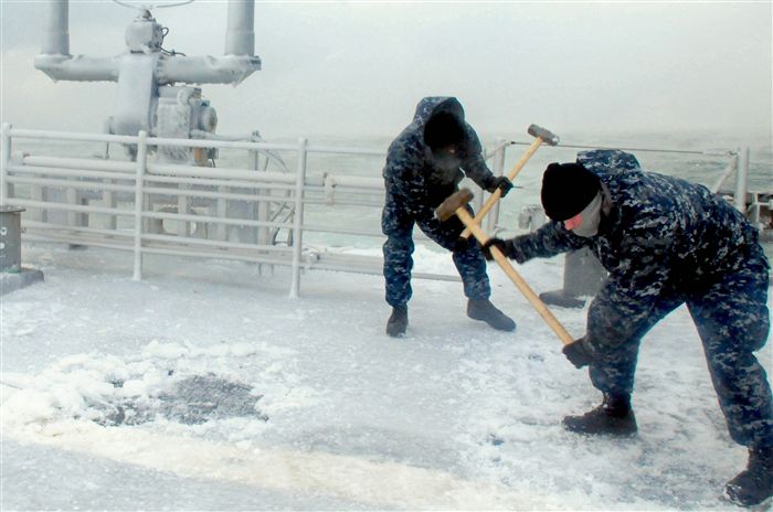 BLACK SEA (Jan. 31, 2012)  Sailors aboard the guided-missile cruiser USS Vella Gulf (CG 72) use sledge hammers to break ice off of the ship. Vella Gulf, homeported out of Norfolk, Va., is currently conducting theater security cooperation and maritime security operations in the U.S. 6th Fleet area of responsibility. 