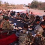 Afghan National Army soldiers and Afghan Uniformed Police joined Marines with Kilo Company, 3rd Battalion, 6th Marine Regiment, recently at a feast held by local leader Mohammad Razul.