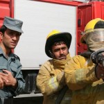 Firefighters from the Kandahar Fire Department practice proper hose handling techniques during a training class provided by Soldiers from the 58th Military Police Company attached to 1st Squadron, 10th Cavalry Regiment, 2nd Brigade Combat Team, 4th Infantry Division at their firehouse.